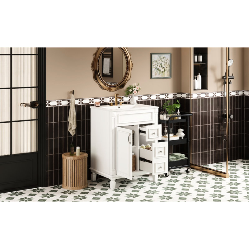Meuble-lavabo de 61 cm (24 pouces) avec lavabo en céramique, 2 tiroirs et tablette réglable. Alliant simplicité française et rangement moderne, il est idéal pour les petites salles de bain et permet un gain d'espace optimal.
