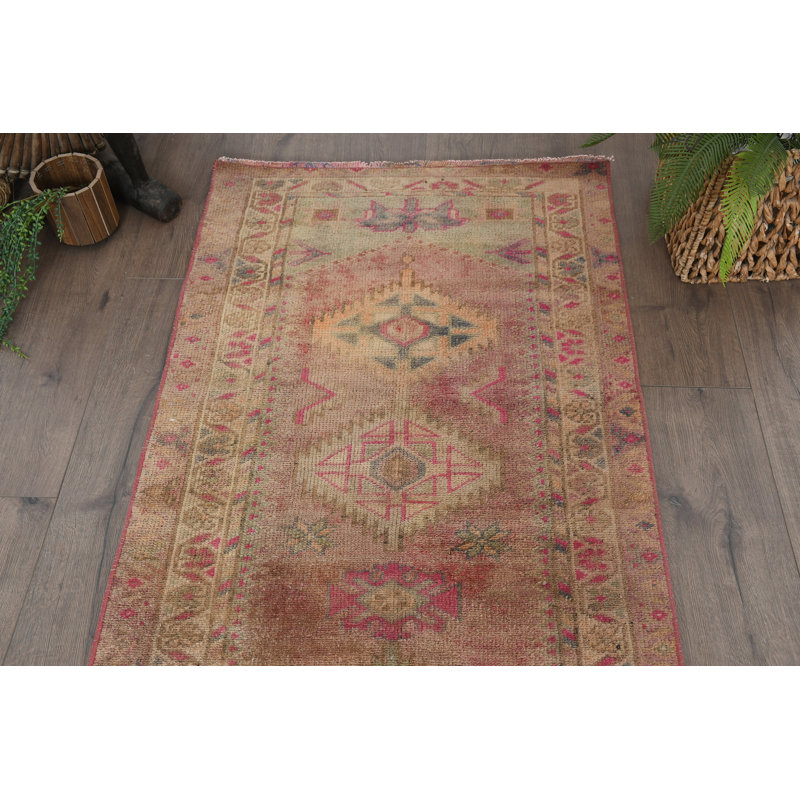 Tapis rose en laine Bohemian
