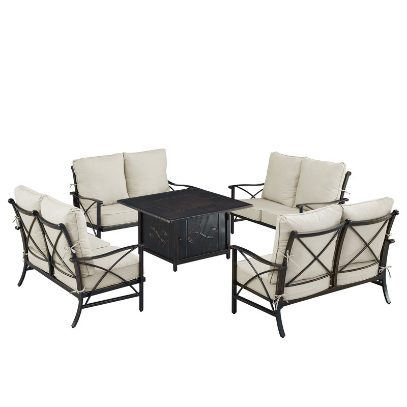Ensemble de table de foyer en aluminium noir avec quatre causeuses profondes