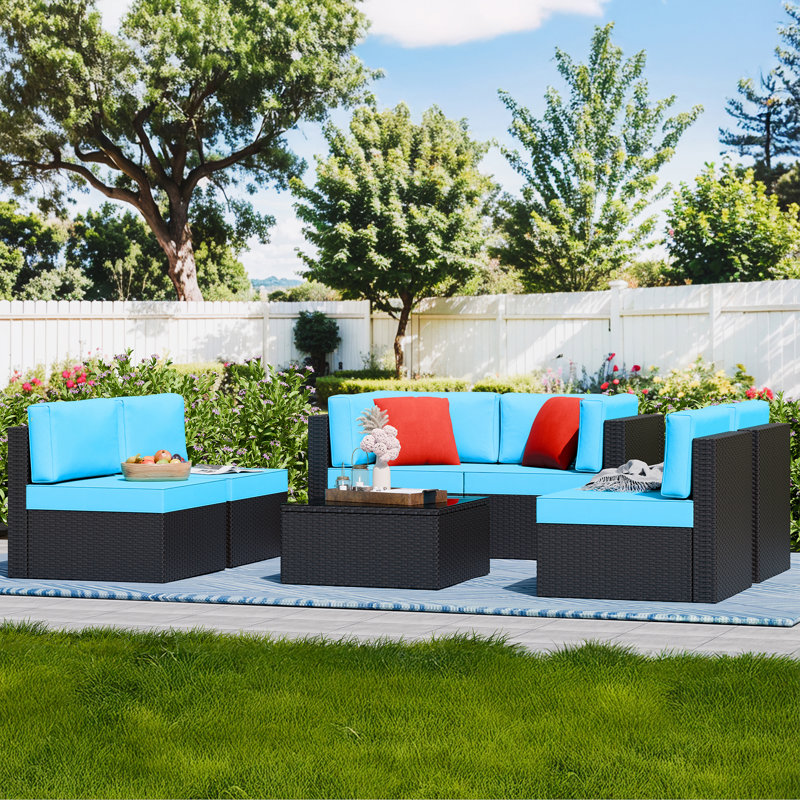 Arleht 7-Piece Wicker / Rattan Outdoor Sectional Seating Group with Cushions, Blue
