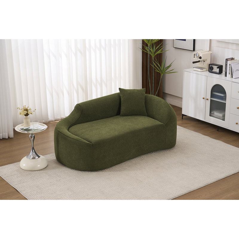 Canapé-lit moderne avec méridienne courbée avec assise profonde et coussin intégré pour le salon ou la chambre à coucher.
