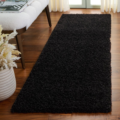 Tapis à poils longs en polypropylène noir Baldev