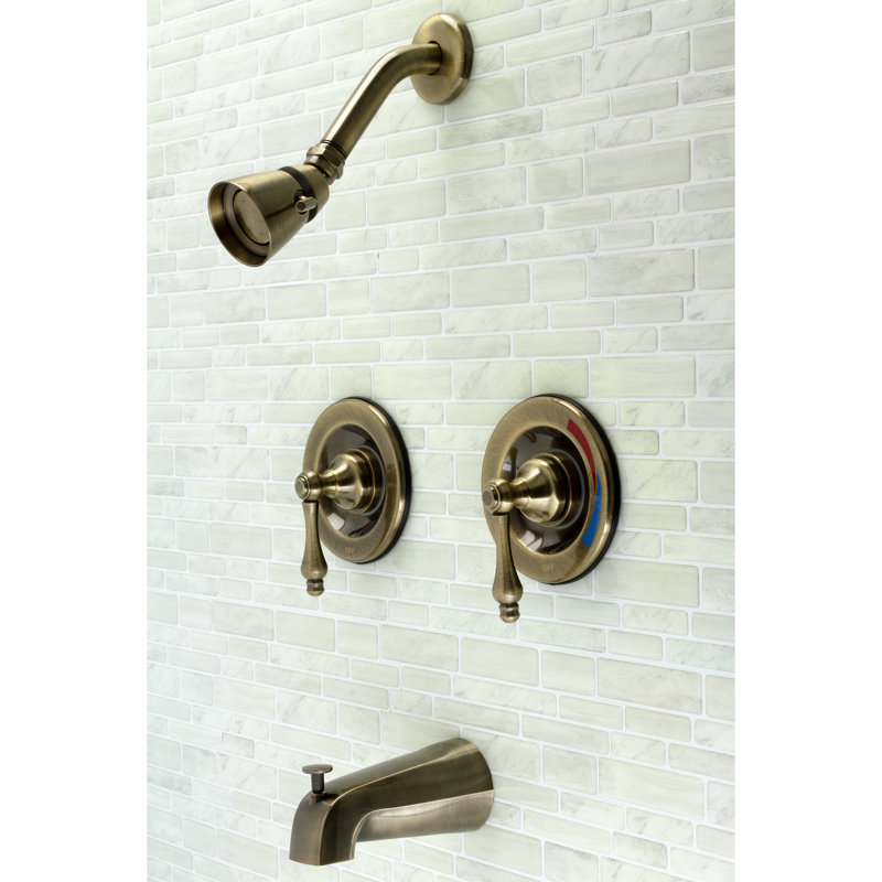 Robinet de baignoire et douche à double poignée à pression équilibrée Kingston Brass Vintage, Laiton antique