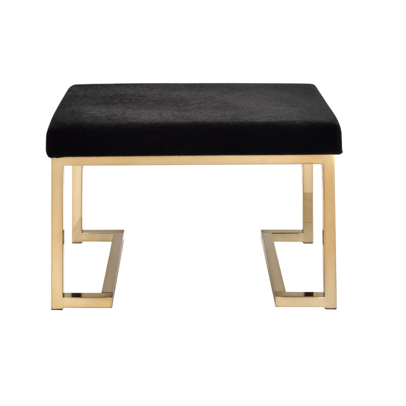 Rectangle sans dossier avec siège en tissu noir rembourré de mousse et base en métal finition champagne