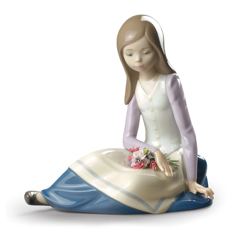 Contemplative Young Girl Figurine