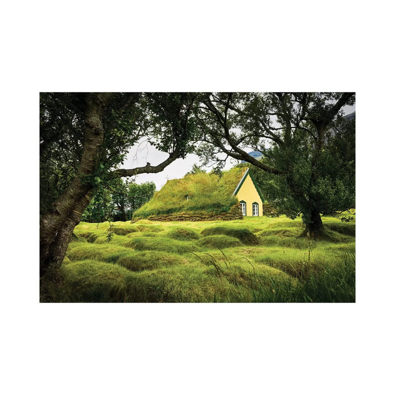 Iceland, Turf-Roofed Hof Church And Surrounding Grave Mounds. by Mark Williford - Wrapped Canvas Print