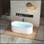 Baignoire autoportante en acrylique de 67 pouces avec conception cannelée, trop-plein intégré et drain en nickel brossé pour les salles de bain modernes
