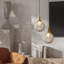 Luminaire suspendu moderne en verre et laiton Ribber-778976737