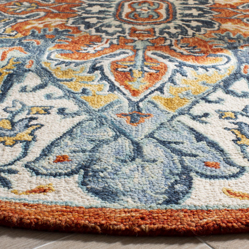 Blue and Rust Round Tufted Wool Floral Rug