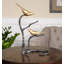 Sculpture oiseaux sur un membre