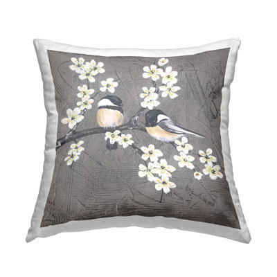 Coussin décoratif à motif d'oiseaux sur une branche, par Jade Reynolds