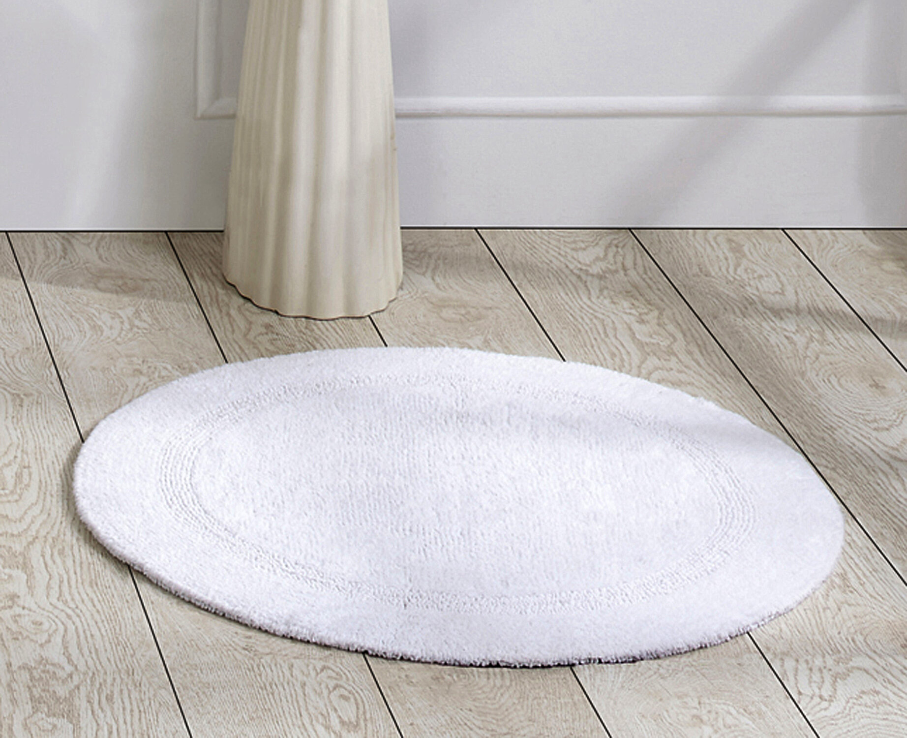https://assets.wfcdn.com/im/74107639/compr-r85/1106/110673317/deidre-lux-100-cotton-bath-mats-machine-washable-reversible-super-absorbent-30-round-bathroom-rugs.jpg