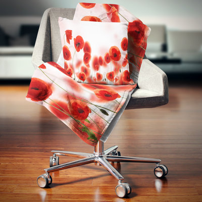 Fleurs de coquelicot sur fond rose - coussin à imprimé floral
