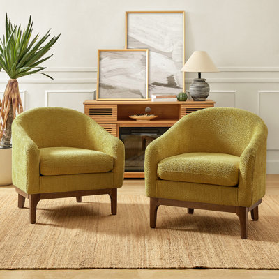 Fauteuil demi-tonneau rembourré avec pieds en bois massif Berklie