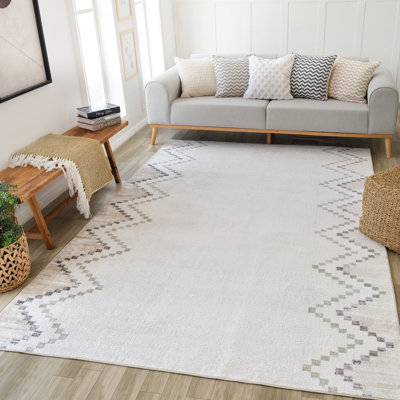 Tapis rectangulaire Kennily avec envers antidérapant