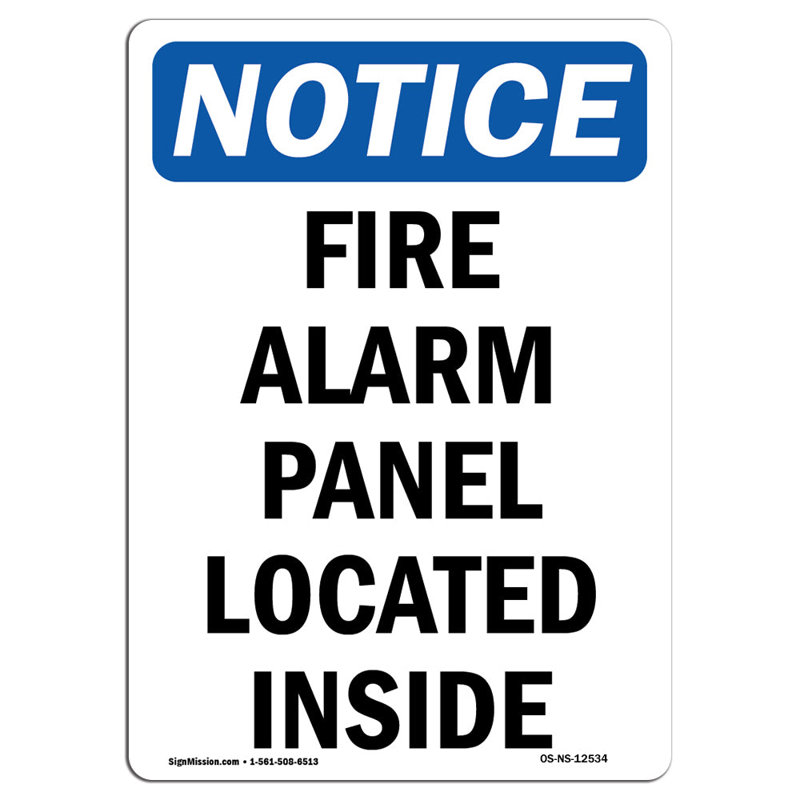 Panneau d’alarme-feu situé à l’intérieur de l’enseigne