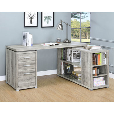 Bureau d'ordinateur gris en bois de grève en forme de L pour bureau à domicile avec finition vieillie et cinq options de rangement