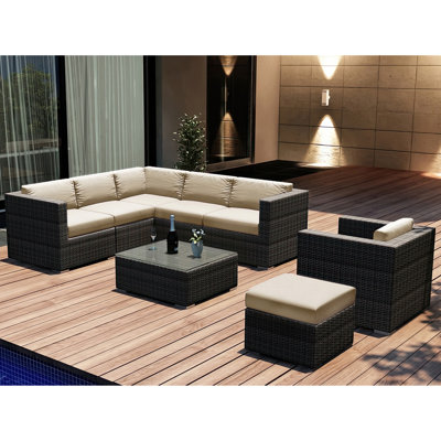 Suffern 9 Piece Rattan Sunbrella Sectional Seating Group with Cushions -  Wade LoganÂ®, 403D167CD4884C51AEB0B332041AC1A0