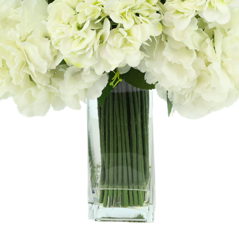 Delphinium, Hydrangea and Fern Floral Arrangement in Tall Glass Vase
