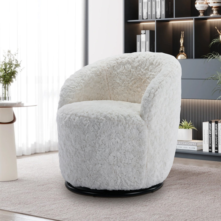 Ivy Bronx Depoliti Oversized Swivel Chair with storage ottoman and