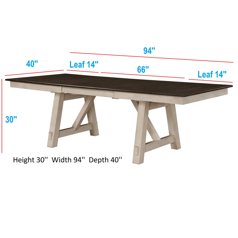 Table de salle à manger en bois de style maison de campagne avec une finition gris craie et des feuilles autoportantes transitionnelles avec des pieds en tréteaux robustes