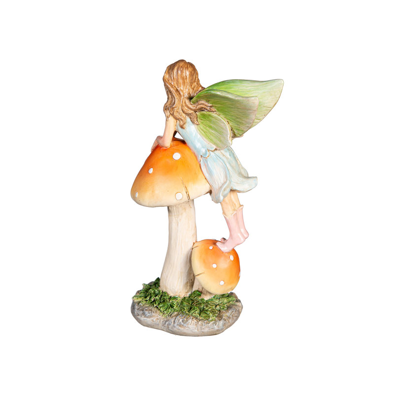 Statue de fée en résine assise sur un champignon, H 6 po
