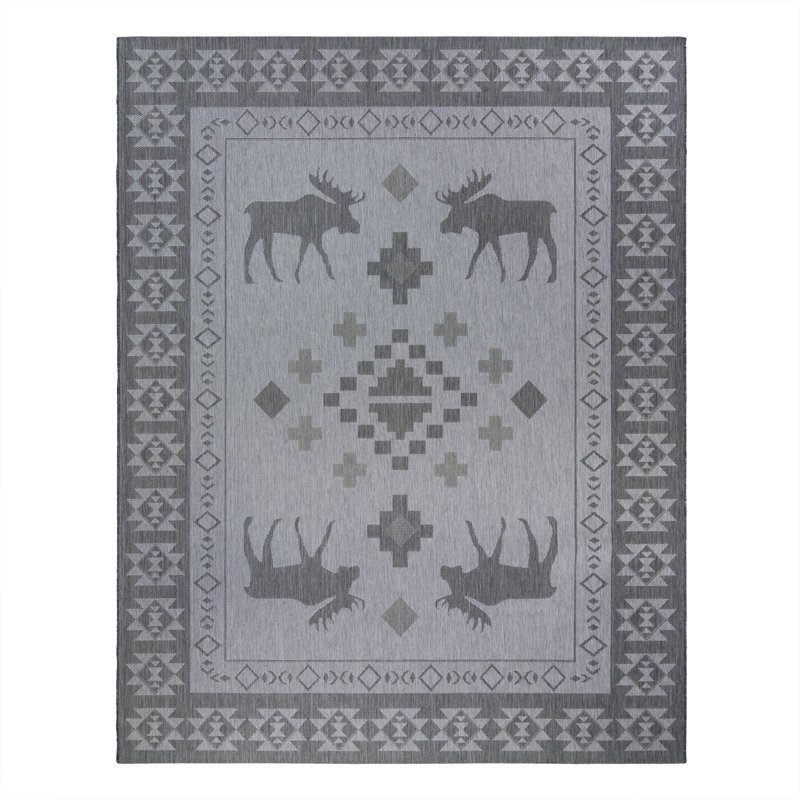 Tapis intérieur / extérieur en polypropylène tissé à plat à motif d'orignaux rustiques crème et ivoire Solterra Gulhayo
