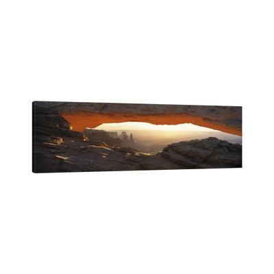 Glowing Daytime View Through Mesa Arch, Canyonlands National Park, Utah, USA by Panoramic Images - Wrapped Canvas Panoramic Print