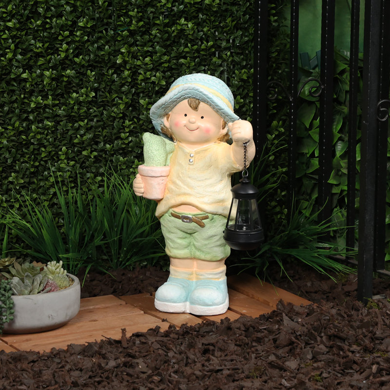 17"H Boy Holding Lantern Solar Statue with LED Lights