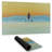 A surfer swimming by dawn - 14.00"x24.25" Desk mat