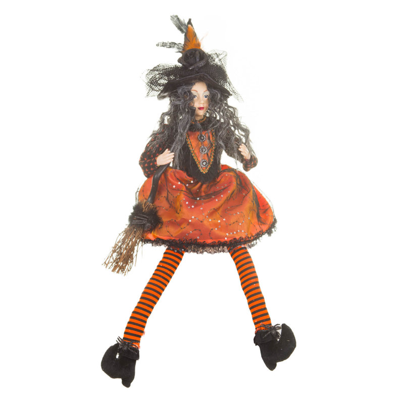 Sorcière captivante orange assise