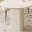 Table à manger ovale simple de style crème et chaise-105492342