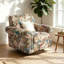 Fauteuil pivotant rembourré avec accoudoirs roulés et garniture cloutée-209640761