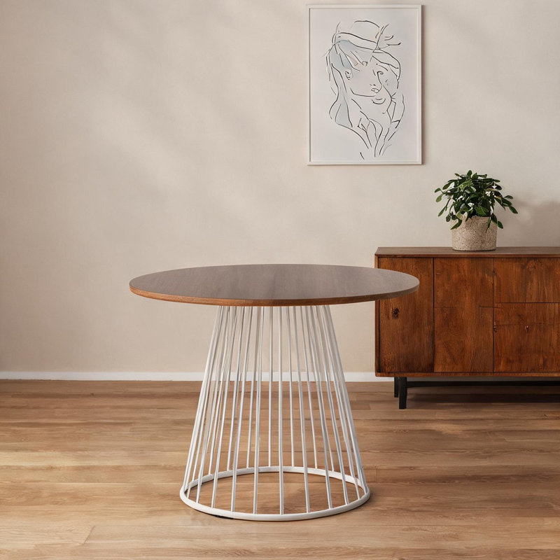 Table de salle à manger ronde à assembler soi-même, avec piètement en tréteaux blanc et plateau en bois pour quatre personnes.