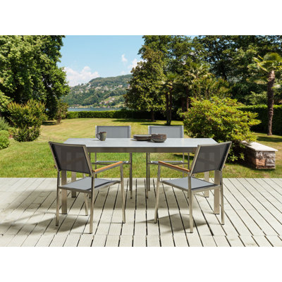 Chryssa 4 - Person Patio Dining Set with Rectangular Table