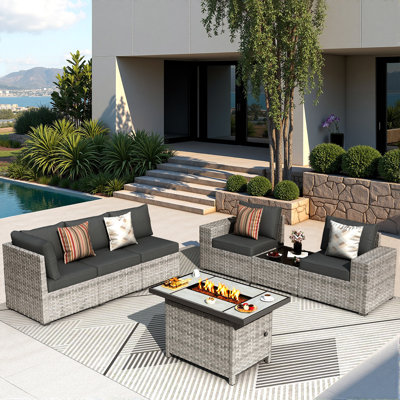 Ensemble de patio modulaire en osier toutes saisons pour 5 personnes avec coussins et foyer