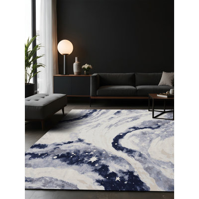 Tapis gris soyeux et moelleux