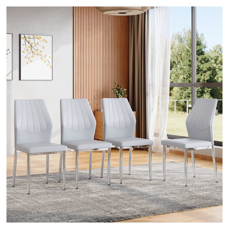 Ensemble de 4 chaises de salle à manger ergonomiques gris clair et argentées revêtues de cuir synthétique d'une hauteur de 37 pouces avec structure en métal et sièges de cuisine modernes