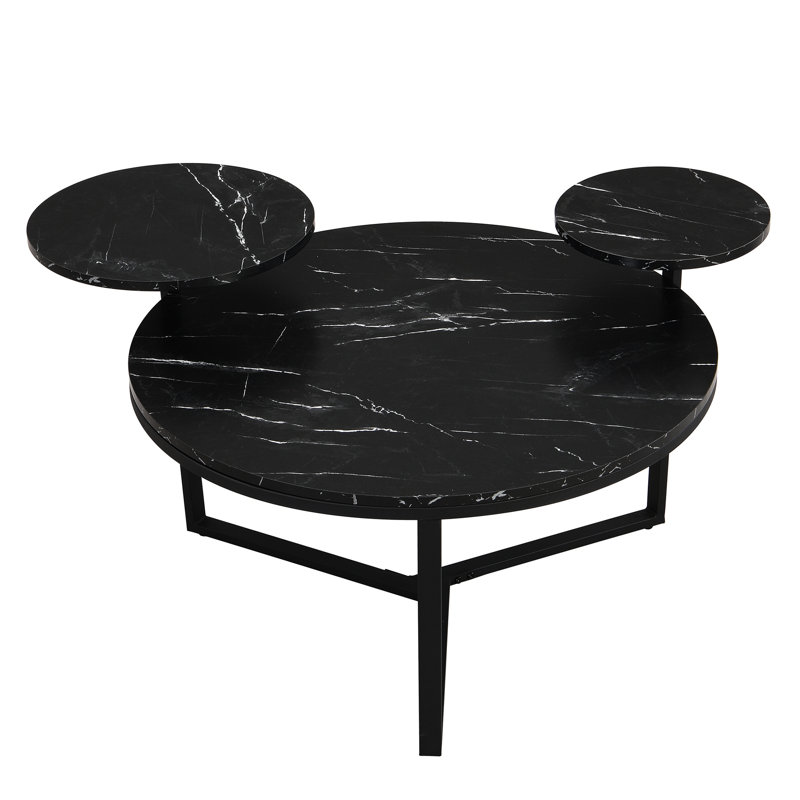 Table basse contemporaine avec deux tablettes, surface en faux marbre, base à trépied, bords arrondis, noir mat, style moderne et solide avec tablettes, surfaces, coins en métal pour trépied,