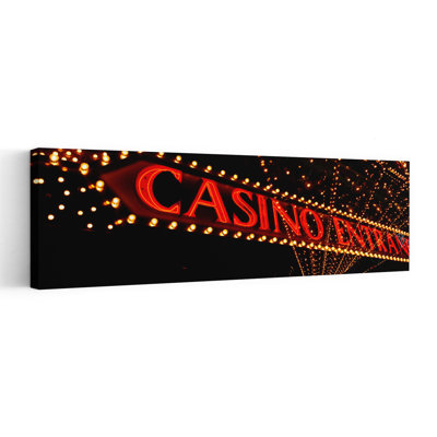 Low Angle View Of Neon Sign Las Vegas Nevada USA by Craig C. Sheumaker - Wrapped Canvas Panoramic Print