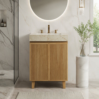 Meuble-lavabo avec lavabo en céramique et comptoir en pierre frittée veinée, sur pied