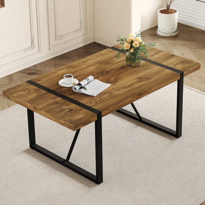Table de salle à manger 71 pouces rectangulaire rétro à grain de bois minimaliste, équipée d'un plateau de table en panneau de fibres à densité moyenne de 2,3 pouces d'épaisseur et de pieds en métal noir.