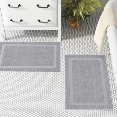 Tapis de bain Clous