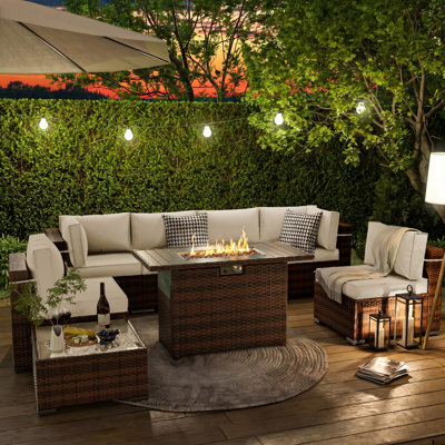 8 Piece Rattan Sectional Seating Group with Cushions and Fire Pit Table