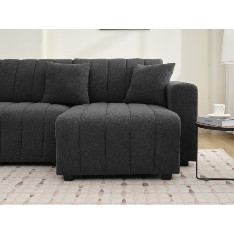 Canapé d'angle 3 places d'inspiration scandinave, revêtement en laine gris foncé, rembourrage en mousse, méridienne réversible, capitonnage précis, silhouette minimaliste, rembourrage en laine douce aux angles, design élégant, tissu à canaux
