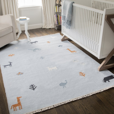 Tapis bleu en laine tissé à la main à imprimé animal