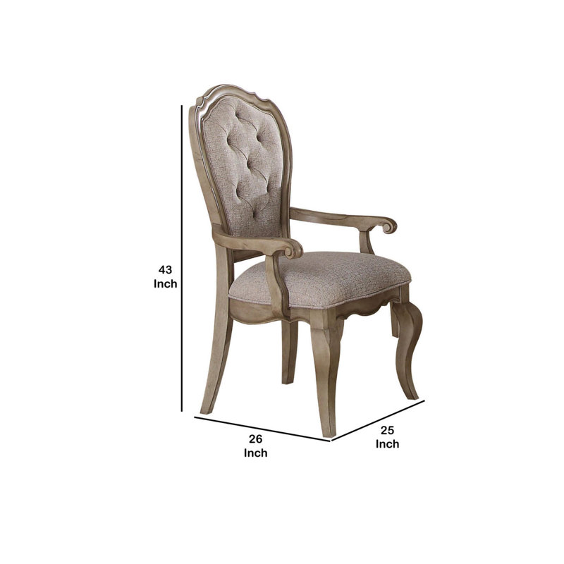 Fauteuil capitonné en tissu gris