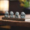 Ensemble de statue de moine zen souriant, figurine de bouddha riant 4 pièces, décoration de maison bonne chance et feng shui, petites statues de bouddha en résine pour la table, le bureau et l'aquarium