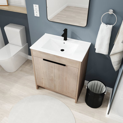 Meuble-lavabo autoportant avec lavabo en céramique blanche et 2 portes d'armoire à fermeture en douceur