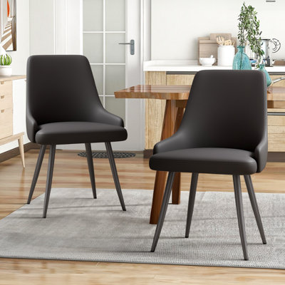 Modern Dining Chairs Set of 2 Spacious Dining Room Chairs with Thick Cushion Comfortable Faux Leather Upholstered Dining Chairs with Metal Legs